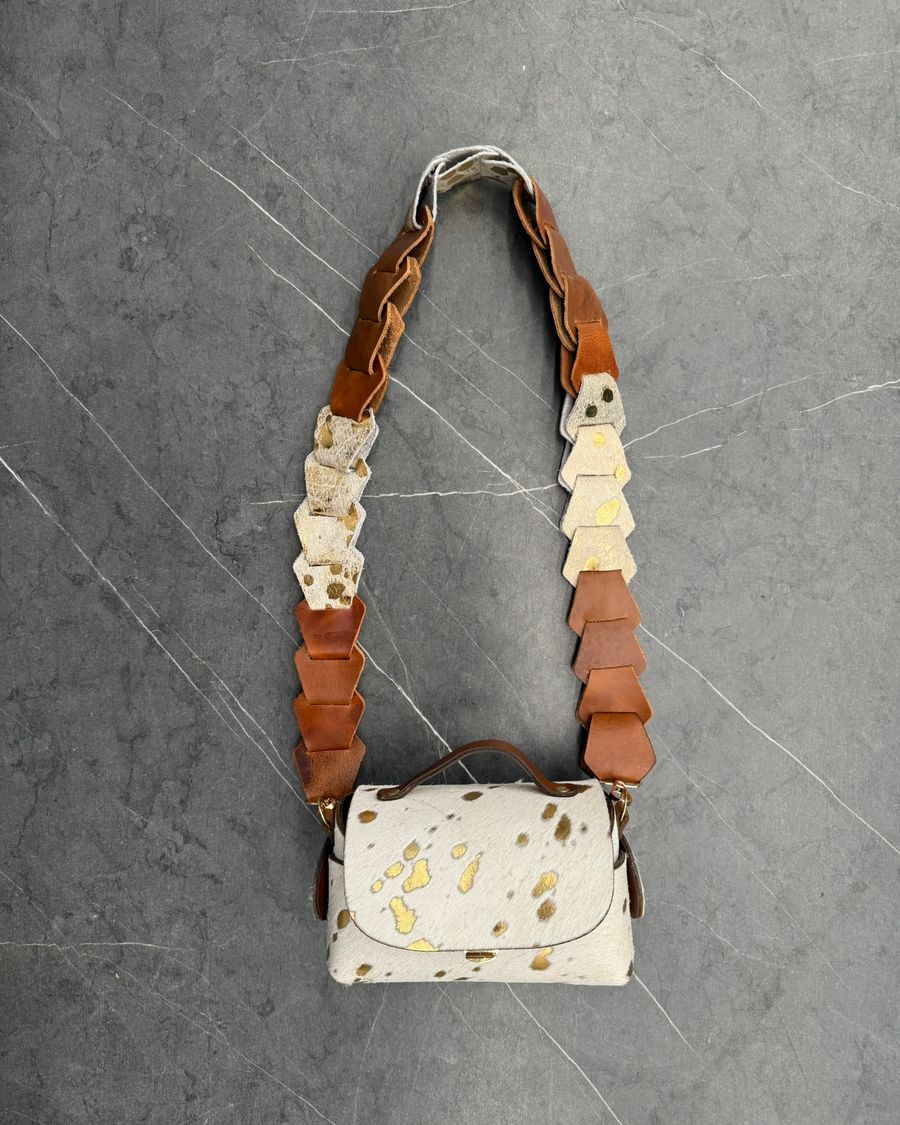 Bolso baúl de cuero con pelaje natural