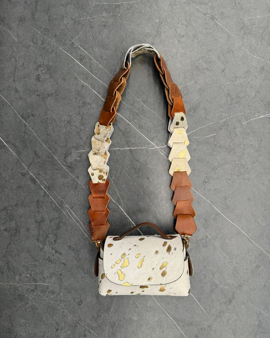 Bolso baúl de cuero con pelaje natural